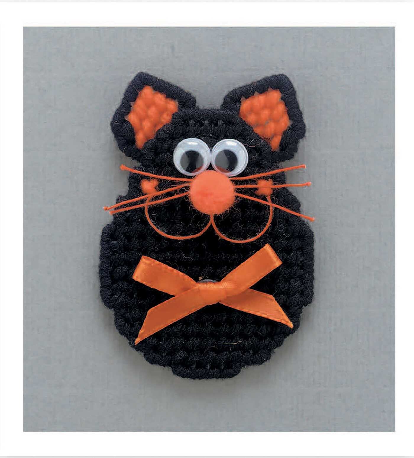 Magnet Board Creations in Plastic Canvas
