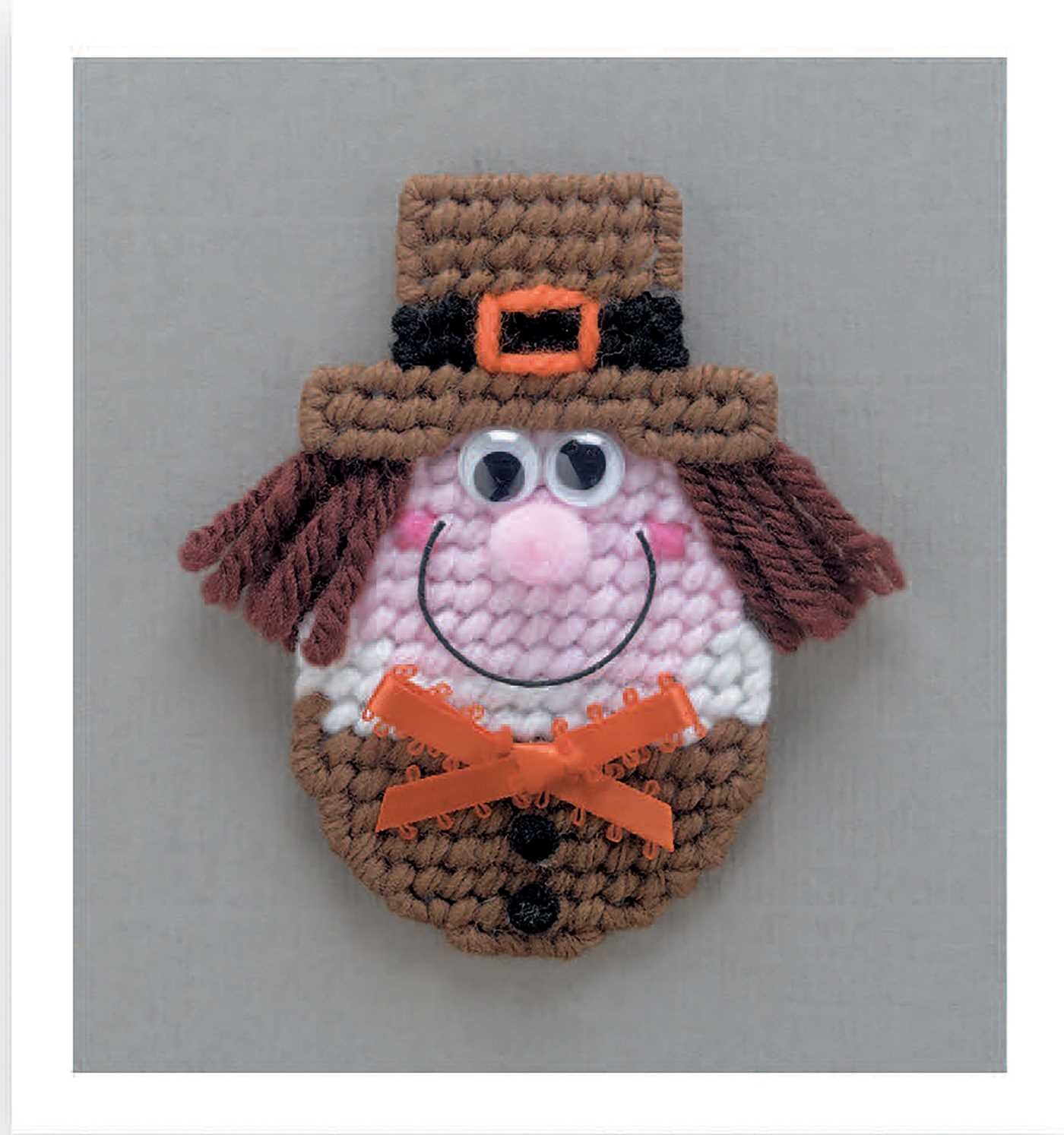Magnet Board Creations in Plastic Canvas