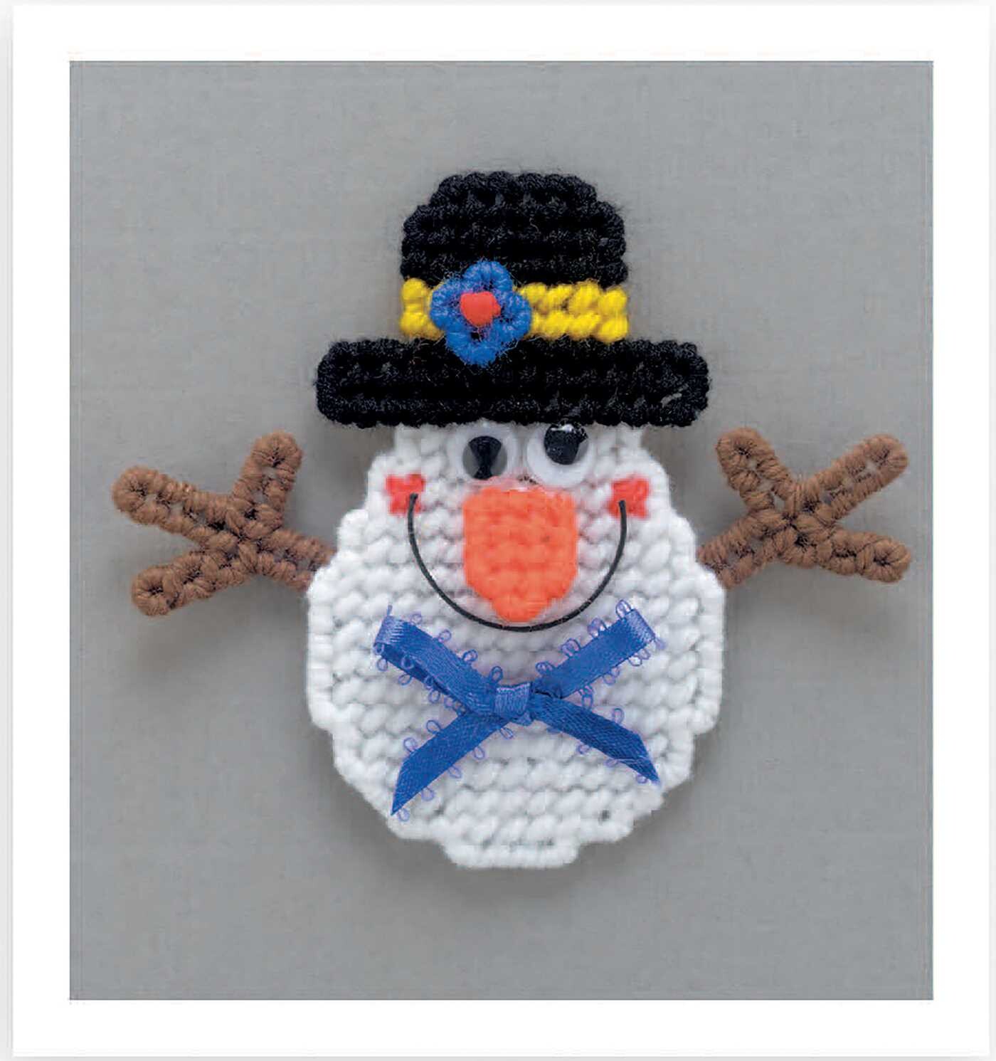 Magnet Board Creations in Plastic Canvas